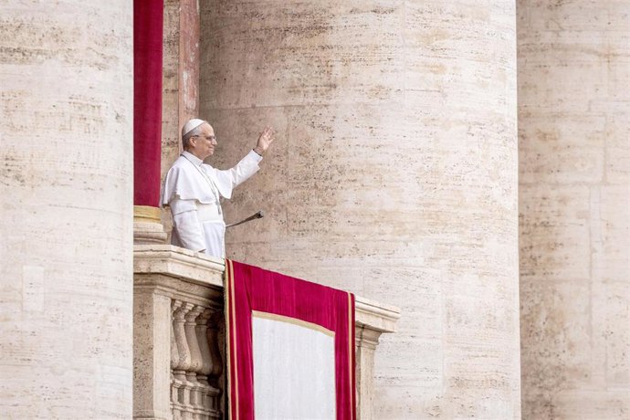 11 May 2025, Vatican: Pope Leo XIV stands on the central balcony of St. Peter's Basilica during his first Sunday blessing. From the balcony of St. Peter's Basilica, the first pontiff from the USA, the former Cardinal Robert Francis Prevost, says the Sunda