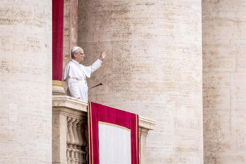 11 May 2025, Vatican: Pope Leo XIV stands on the central balcony of St. Peter's Basilica during his first Sunday blessing. From the balcony of St. Peter's Basilica, the first pontiff from the USA, the former Cardinal Robert Francis Prevost, says the Sun