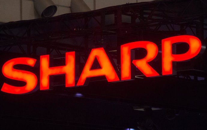 Archivo - FILED - 04 October 2012, Japan, Chiba: A general view of the logo of Japanese electronics company Sharp at the Ceatec trade fair. Sharp lowered its forecast for sales for the current fiscal year ending 31 March 2020 due to the slow recovery in d