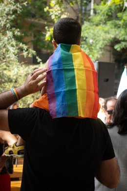 Archivo - Varias personas durante una concentración de entidades LGTBI