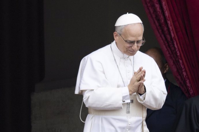 11 May 2025, Vatican: Pope Leo XIV stands on the central balcony of St. Peter's Basilica during his first Sunday blessing. From the balcony of St. Peter's Basilica, the first pontiff from the USA, the former Cardinal Robert Francis Prevost, says the Sunda