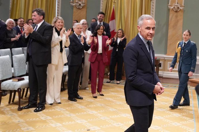 May 13, 2025, Ottawa, CANADA: Canadian Prime Minister Mark Carney, right, arrives for the cabinet swearing-in ceremony at Rideau Hall in Ottawa on Tuesday, May 13, 2025.