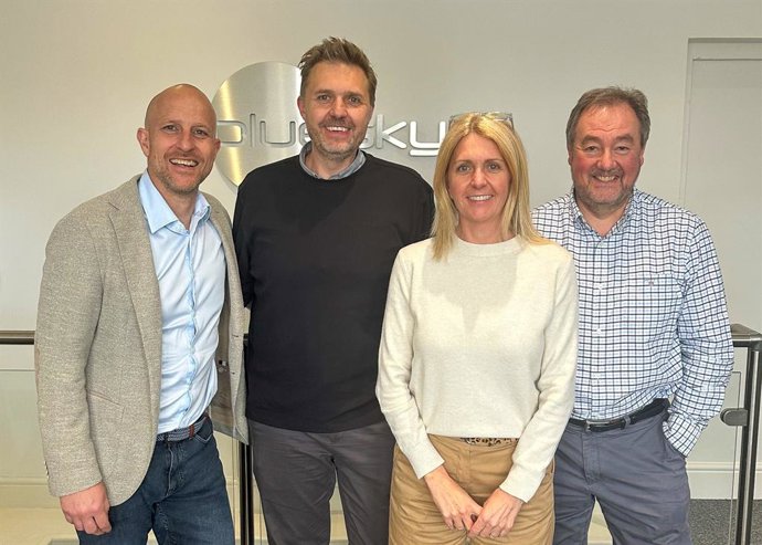 Woolpert welcomes the Bluesky leadership team of (from left) CCO Ralph Coleman, COO Simon Tidmarsh, CEO Rachel Tidmarsh, and CFO Glyn Wheeler.