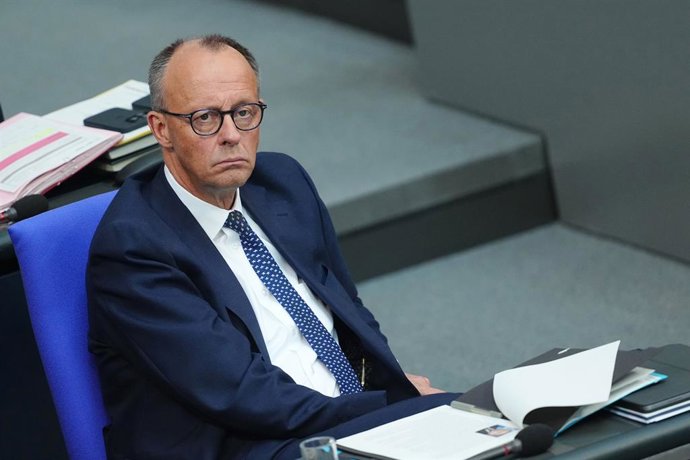 14 May 2025, Berlin: Germany's Chancellor Friedrich Merz sits during the speech by Alice Weidel, leader of the Alternative for Germany (AfD) parliamentary group in the German Bundestag, after the government statement in the plenary session of the German B