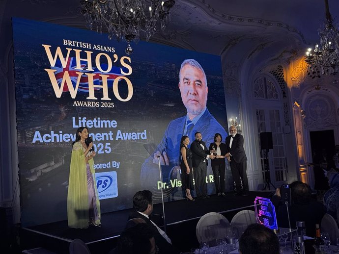GEDU staff accept the award