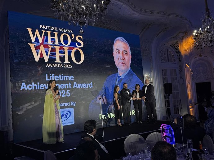 GEDU staff accept the award