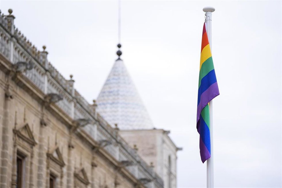 Archivo - Izado de la bandera LGTBI en la fachada del Parlamento andaluz. A 27 de junio de 2024, en Sevilla (Andalucía, España). 