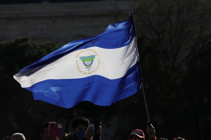 Archivo - January 12, 2019 - Madrid, Spain - Waving flag of Nicaragua seen during the protest..The Nicaraguan community based in Madrid, Spain, called on the Nicaraguans to hold a demonstration that started from Plaza ColĂłn and ended in front of the Nica