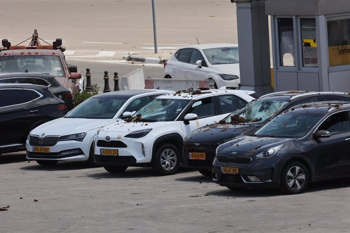 TEL AVIV, May 4, 2025  -- Damaged vehicles are seen near the Ben Gurion International Airport following a missile attack in Tel Aviv, Israel, May 4, 2025. A missile launched by Yemen's Houthi forces struck Israel's Ben Gurion International Airport on Sund