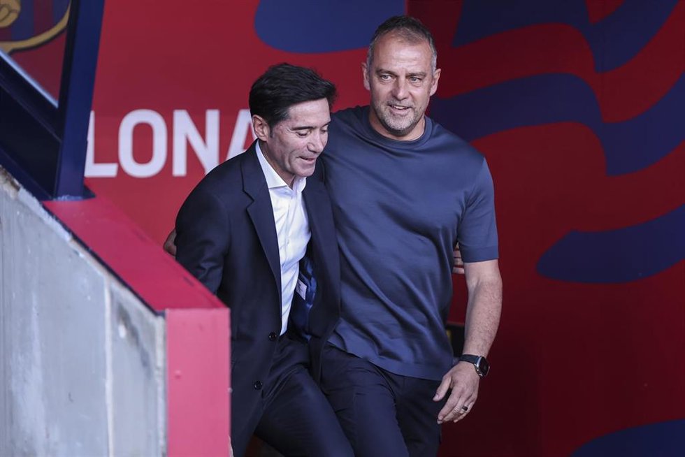 Hansi Flick, head coach of FC Barcelona greets Marcelino Garcia, head coach of Villarreal CF during the Spanish league, La Liga EA Sports, football match played between FC Barcelona and Villarreal CF