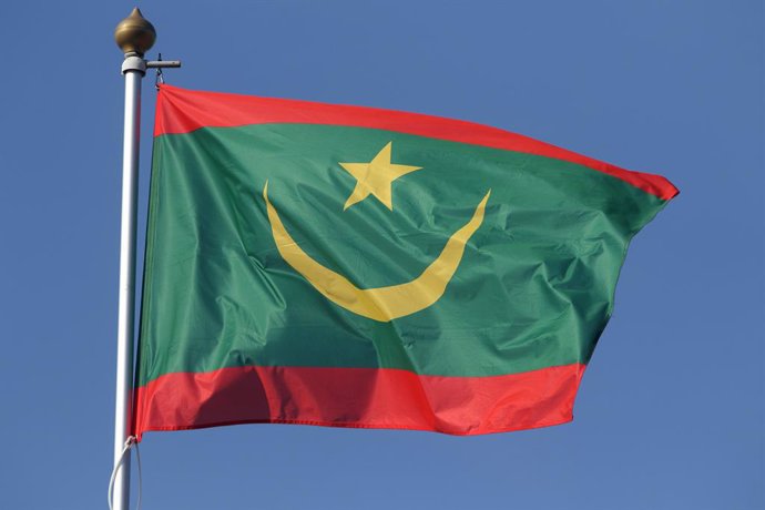 Archivo - September 25, 2024, Saint Petersburg, Russia: The national flag of the Islamic Republic of Mauritania fluttering in the wind on a flagpole in Saint Petersburg, Russia.