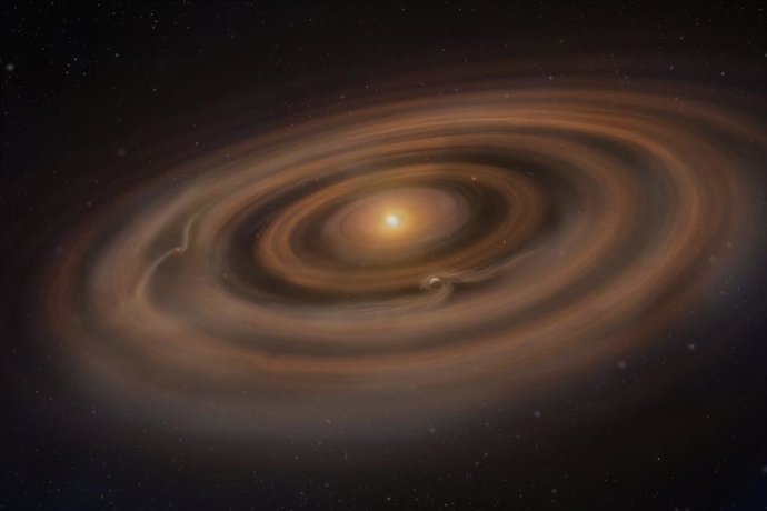 Impresión artística de un disco protoplanetario con planetas en formación que redistribuyen el gas y el polvo a su alrededor