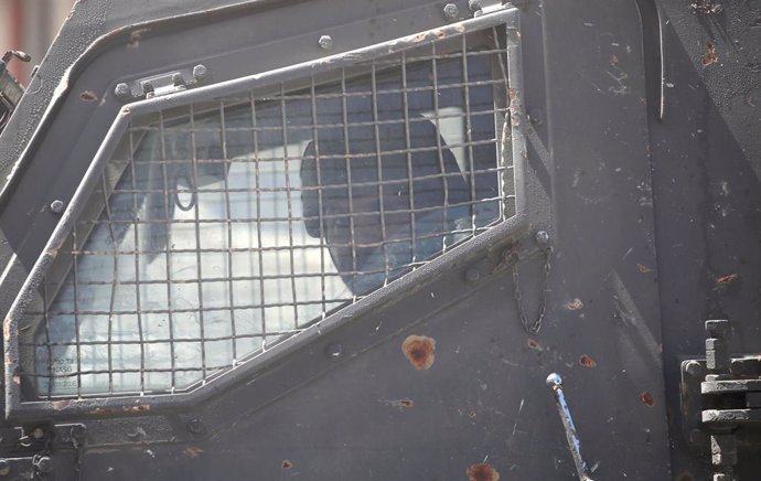 May 20, 2025, Nablus, West Bank, Palestine: An Israeli soldier seen inside an Israeli army armored vehicle during a raid on neighborhoods in the Askar refugee camp east of Nablus in the West Bank. Israeli soldiers raided neighborhoods and homes in search 