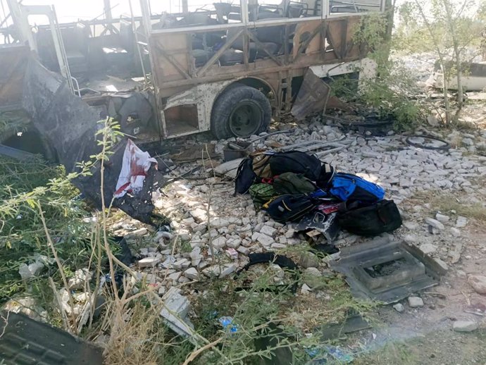 KHUZDAR , May 21, 2025  -- This photo taken on May 21, 2025 shows the site of the terrorist attack on a school bus in Khuzdar district of Balochistan province in Pakistan. Five people, including three students, were killed and several others injured when 