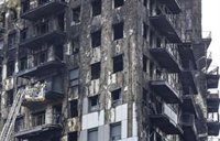 Los propietarios del edificio de Campanar barajan una nueva fachada de cerámica o de caravista