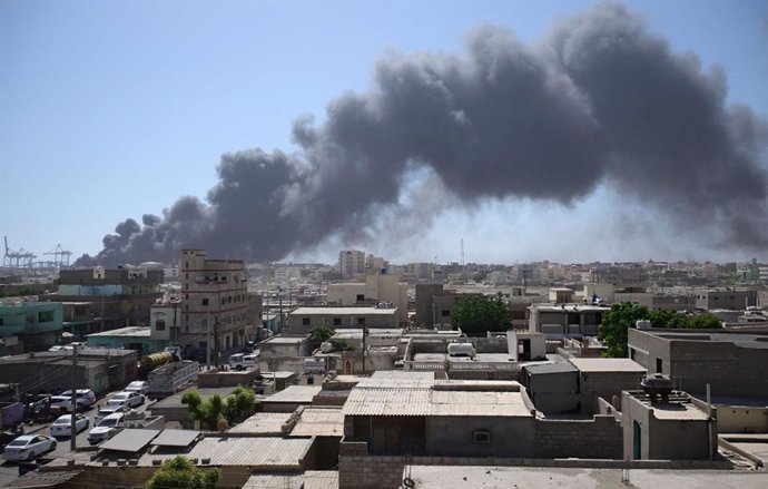 PORT SUDAN (SUDAN), May 6, 2025  -- Smoke rises after a drone attack in Port Sudan, eastern Sudan, on May 6, 2025. The drone attacks on Tuesday struck strategic sites in Port Sudan, a port city on the Red Sea in eastern Sudan, including the international 