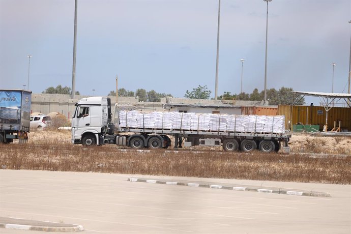 KEREM SHALOM CROSSING, May 20, 2025  -- A truck carrying aid is seen at the Israel's side of Kerem Shalom crossing, on May 20, 2025. A total of 93 United Nations trucks carrying humanitarian aid, including flour for bakeries, infant food, medical equipmen