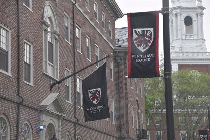 May 3, 2025, Cambridge, Ma, USA: Harvard University Area  Scenes. Students and visitors walk along Massachusetts Avenue at Harvard Square. Harvard University is an active and scenic area contributing to art and culture and intellectual and economic life o