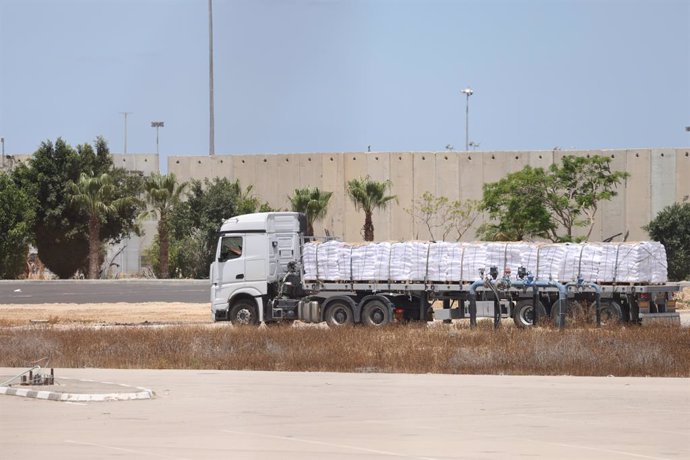 KEREM SHALOM CROSSING, May 20, 2025  -- A truck carrying aid is seen at the Israel's side of Kerem Shalom crossing, on May 20, 2025. A total of 93 United Nations trucks carrying humanitarian aid, including flour for bakeries, infant food, medical equipmen