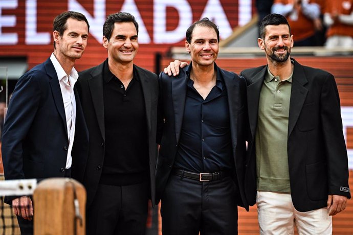 Britain's tennis coach Andy MURRAY, Serbia's Novak DJOKOVIC, former Swiss tennis player Roger FEDERER greet former Spanish player Rafael NADAL during a ceremony honoring his career during the Roland-Garros 2025, French Open, Grand Slam tennis tournament o