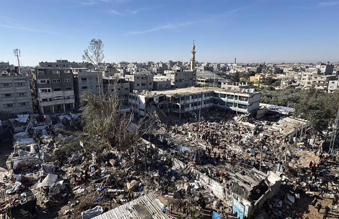 May 7, 2025, Al Bureij, Gaza Strip, Palestinian Territory: Palestinians inspect the damage caused by an Israeli airstrike targeting a school housing displaced people for the second time in Al-Bureij refugee camp in the central Gaza Strip, on May 7, 2025