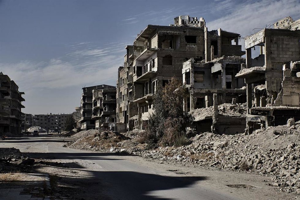 Archivo - Imagen de archivo de edificios destruidos por el conflicto en la capital de Siria, Damasco