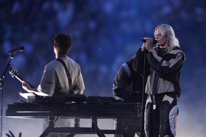 Emily Armstrong, Lead Singer of Linkin Park performs with Mike Shinoda, Singer of Linkin Park, Brad Delson, Lead Guitarist of Linkin Park and Dave Pharrell, Bass Player of Linkin Park during of the UEFA Champions League Final 2025 between Paris Saint-Germ