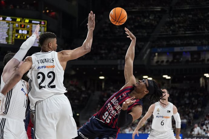 Chima Moneke of Baskonia and Edy Tavares of Real Madrid in action during the Playoff quarter finals of the Spanish League, Liga ACB Endesa, basketball match played between Real Madrid and Saski Baskonia at Movistar Arena on June 03, 2025 in Madrid, Spain.