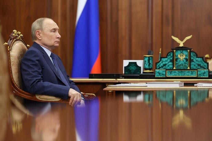 RUSSIA, MOSCOW - MAY 30, 2025: Vladimir Putin, President of Russia, attends a meeting with Archpriest Alexander Tkachenko, Board Chairman of the Krug Dobra [Circle of Kindness] Foundation, Chairman of the Commission on Social Partnership, Care and the Dev