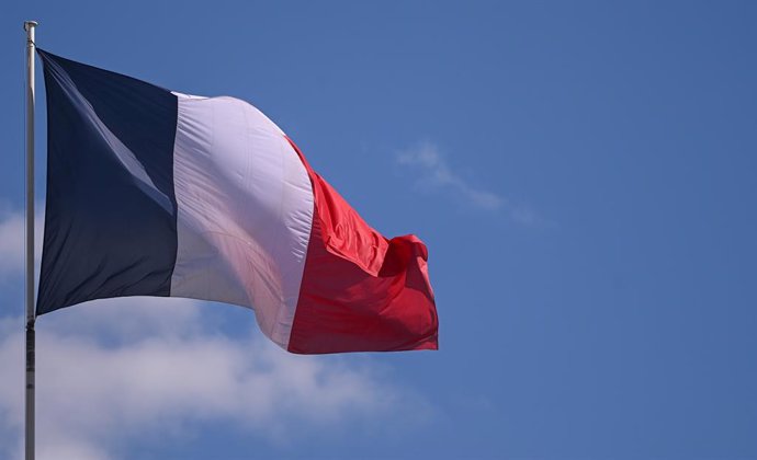 May 23, 2025, Paris, Ile-De-France (Region, France: The French flag flies above the Elysee Palace during the Council of Ministers on May 23, 2025