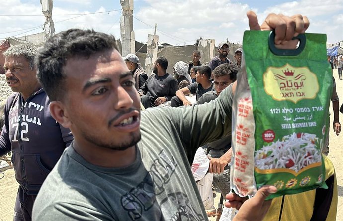 28 de maio de 2025, Rafah, Faixa de Gaza, Território Palestino: Palestinos em busca de ajuda se reúnem perto de um local de distribuição de ajuda administrado pela Gaza Humanitarian Foundation, apoiada pelos EUA, em Rafah, no sul da Faixa de Gaza, em 27 d