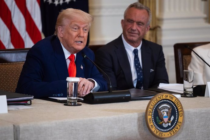 May 22, 2025, Washington, District Of Columbia, USA: United States President Donald J Trump and US Secretary of Health and Human Services Robert F. Kennedy, Jr take part in a Make America Healthy Again (MAHA) Commission event in the East Room of the White