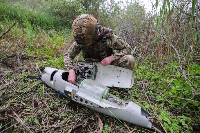 RUSSIA, KHERSON REGION - MAY 20, 2025: A serviceman examines Raybird, a Ukrainian unmanned aerial system shot down by the 61st Naval Infantry Brigade of the Northern Fleet during the special military operation