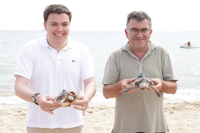El conseller de Agricultura, Pesca y Medio Natural, Joan Simonet, y el regidor del Ayuntamiento de Palma Llorenç Bauzá.