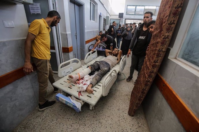 GAZA, June 11, 2025  -- A Palestinian man injured by Israeli army near an aid distribution center in the central Gaza Strip is seen at a hospital in Gaza City, on June 11, 2025. At least 28 Palestinians were killed on Wednesday by the Israeli army near an
