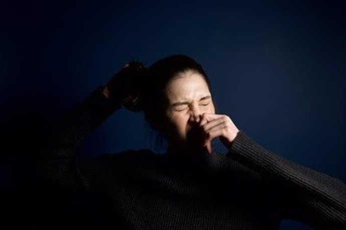 Mujer con alergia.