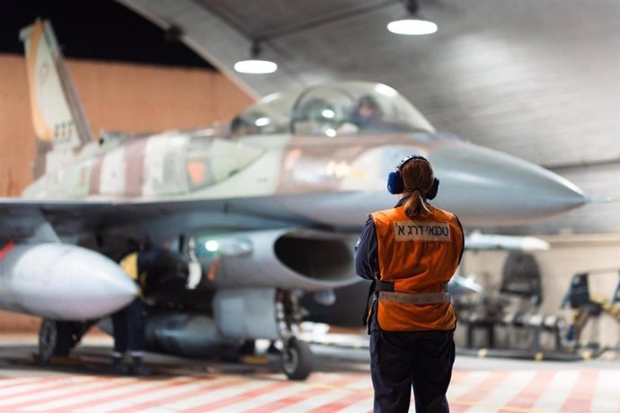 JERUSALEM, June 13, 2025  -- This photo issued by Israel Defense Forces (IDF) on June 13, 2025 shows an Israeli military aircraft preparing for airstrike operations in Iran. The strike was part of a broader operation launched by Israel early Friday, which