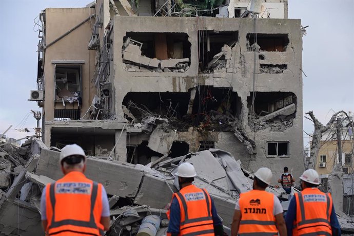 BNEI BRAK, June 16, 2025  -- Israeli security and rescue forces work at the scene of a missile attack from Iran in Bnei Brak, central Israel, on June 16, 2025. Iran has launched missile attacks on multiple targets in Israel since Friday, causing casualtie