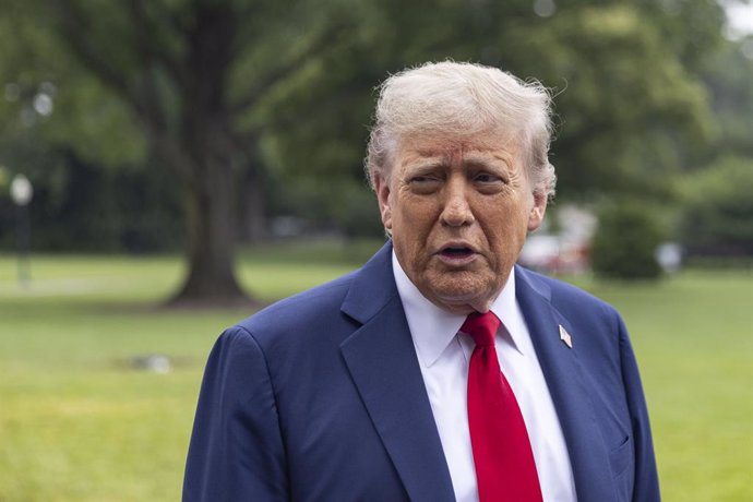 June 15, 2025, Washington, District Of Columbia, USA: U.S. President Donald Trump speaks to members of the press on the South Lawn of the White House before boarding Marine One en route to Calgary, Canada, on June 15, 2025. Trump is traveling to attend th