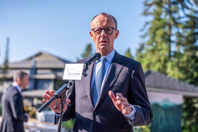 16 June 2025, Canada, Kananaskis: German Chancellor Friedrich Merz gives a press statement before at the Pomeroy Kananaskis Mountain Lodge, before the G7 leaders' summit in Kananaskis. Photo: Michael Kappeler/dpa-Pool/dpa