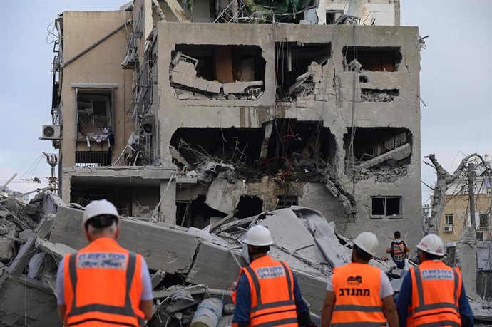 BNEI BRAK, June 16, 2025  -- Israeli security and rescue forces work at the scene of a missile attack from Iran in Bnei Brak, central Israel, on June 16, 2025. 