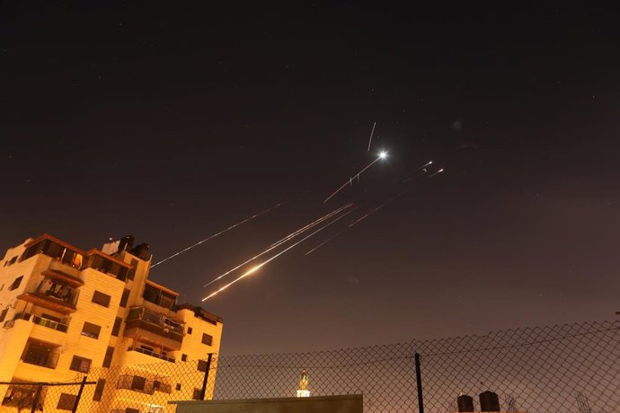 HEBRON, June 16, 2025  -- Missile traces are seen from the city of Hebron in the southern West Bank, during Iran's missile attack against Israel, on June 16, 2025.