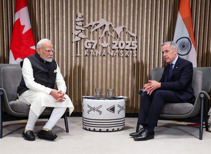 O primeiro-ministro indiano Narendra Modi e seu colega canadense, Mark Carney.