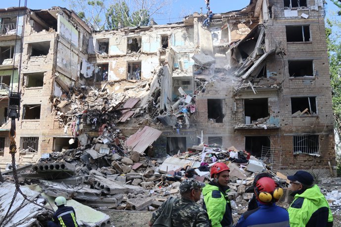 KIEV, June 23, 2025  -- Staff members of the State Service for Emergencies of Ukraine conduct search and clearance operations at the site of an air strike in Kiev, Ukraine, on June 23, 2025.