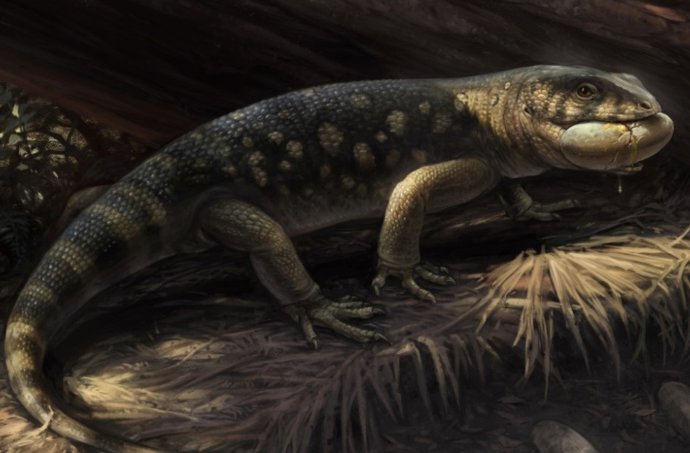 Reconstrução artística de Bolg amondol, retratado invadindo um ninho de dinossauro oviraptorossauro em meio ao exuberante habitat da Formação Kaiparowits.