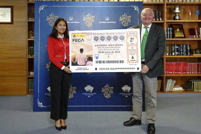 El presidente de Loterías y Apuestas del Estado, Jesús Huerta, y la presidenta del Fondo Español de Garantía Agraria (FEGA), María José Hernández.