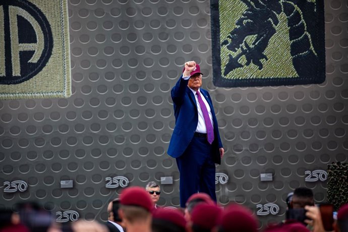 June 10, 2025, Fort Bragg, Nc, United States of America: U.S. President Donald Trump gestures to the crowd before delivering remarks celebrating the Army 250 birthday at Fort Bragg Military Base, June 10, 2025 in Fort Bragg, North Carolina. Trump delivere