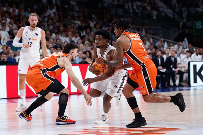 Andres Feliz of Real Madrid, Josep Puerto and Chris Jones of Valencia Basket in action during the Spanish League, Final first leg of Liga ACB Endesa, basketball match played between Real Madrid and Valencia Basket at Movistar Arena on June 20, 2025, in Ma