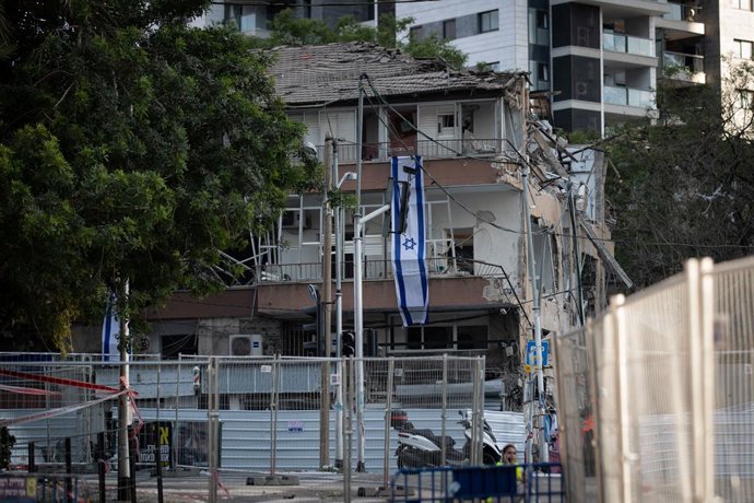 TEL AVIV, June 21, 2025  -- This photo shows a building damaged during missile attacks near Tel Aviv, Israel, June 20, 2025. Since the outbreak of the Israel-Iran military conflict, Tel Aviv and surrounding areas in central Israel have been hit multiple t