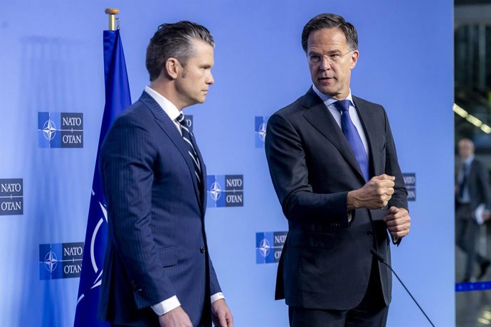 HANDOUT - 05 June 2025, Belgium, Brussels: NATO Secretary General Mark Rutte and US Secretary of Defense, Pete Hegseth address the media after their meeting on the sidelines of the NATO summit in Brussels. Photo: ---/NATO/dpa - ATTENTION: editorial use on